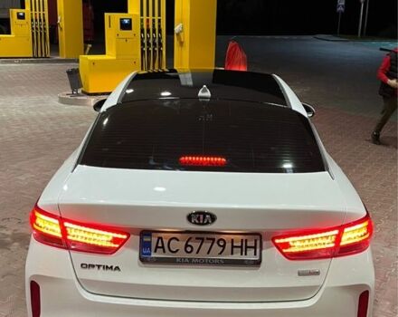 Білий Кіа Оптіма, об'ємом двигуна 2 л та пробігом 210 тис. км за 317 $, фото 1 на Automoto.ua