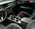 Білий Кіа Оптіма, об'ємом двигуна 2.36 л та пробігом 142 тис. км за 10000 $, фото 9 на Automoto.ua