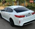 Білий Кіа Оптіма, об'ємом двигуна 2 л та пробігом 200 тис. км за 12700 $, фото 4 на Automoto.ua