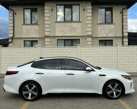 Білий Кіа Оптіма, об'ємом двигуна 2 л та пробігом 80 тис. км за 15900 $, фото 4 на Automoto.ua