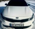 Белый Киа Оптима, объемом двигателя 2 л и пробегом 230 тыс. км за 13000 $, фото 1 на Automoto.ua