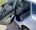 Білий Кіа Оптіма, об'ємом двигуна 2 л та пробігом 139 тис. км за 14900 $, фото 5 на Automoto.ua