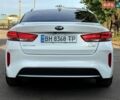 Білий Кіа Оптіма, об'ємом двигуна 2 л та пробігом 200 тис. км за 12700 $, фото 6 на Automoto.ua