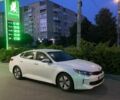 Белый Киа Оптима, объемом двигателя 2 л и пробегом 183 тыс. км за 12800 $, фото 1 на Automoto.ua