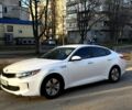 Білий Кіа Оптіма, об'ємом двигуна 2 л та пробігом 138 тис. км за 13500 $, фото 1 на Automoto.ua