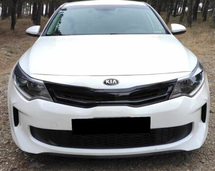 Белый Киа Оптима, объемом двигателя 2 л и пробегом 83 тыс. км за 9800 $, фото 1 на Automoto.ua