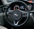 Білий Кіа Оптіма, об'ємом двигуна 2.36 л та пробігом 110 тис. км за 11550 $, фото 12 на Automoto.ua