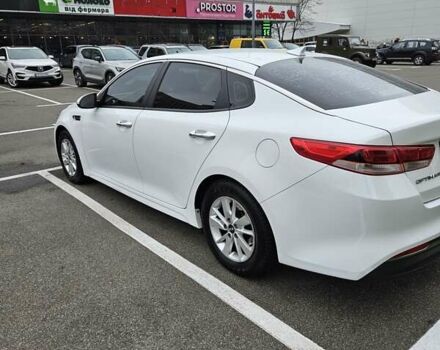 Білий Кіа Оптіма, об'ємом двигуна 2.36 л та пробігом 197 тис. км за 11000 $, фото 1 на Automoto.ua