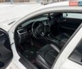 Білий Кіа Оптіма, об'ємом двигуна 2 л та пробігом 190 тис. км за 13800 $, фото 9 на Automoto.ua