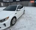 Білий Кіа Оптіма, об'ємом двигуна 2 л та пробігом 190 тис. км за 13800 $, фото 1 на Automoto.ua