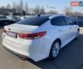 Білий Кіа Оптіма, об'ємом двигуна 2.36 л та пробігом 142 тис. км за 14200 $, фото 4 на Automoto.ua