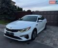 Білий Кіа Оптіма, об'ємом двигуна 2.36 л та пробігом 111 тис. км за 12500 $, фото 1 на Automoto.ua