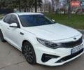 Белый Киа Оптима, объемом двигателя 1.6 л и пробегом 262 тыс. км за 12950 $, фото 1 на Automoto.ua
