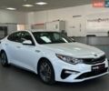 Белый Киа Оптима, объемом двигателя 2 л и пробегом 161 тыс. км за 18190 $, фото 1 на Automoto.ua