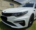 Білий Кіа Оптіма, об'ємом двигуна 2 л та пробігом 75 тис. км за 10200 $, фото 4 на Automoto.ua