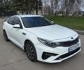 Білий Кіа Оптіма, об'ємом двигуна 1.6 л та пробігом 262 тис. км за 12950 $, фото 1 на Automoto.ua