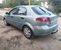 Белый Киа Оптима, объемом двигателя 2 л и пробегом 163 тыс. км за 17490 $, фото 1 на Automoto.ua
