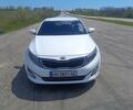 Білий Кіа Оптіма, об'ємом двигуна 2 л та пробігом 285 тис. км за 9498 $, фото 1 на Automoto.ua