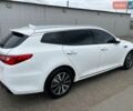 Белый Киа Оптима, объемом двигателя 1.6 л и пробегом 208 тыс. км за 15300 $, фото 4 на Automoto.ua