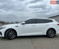 Белый Киа Оптима, объемом двигателя 1.6 л и пробегом 208 тыс. км за 15300 $, фото 2 на Automoto.ua