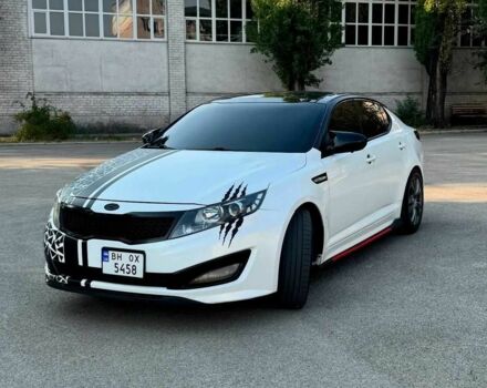 Белый Киа Оптима, объемом двигателя 2 л и пробегом 285 тыс. км за 8700 $, фото 1 на Automoto.ua