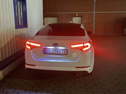 Белый Киа Оптима, объемом двигателя 2 л и пробегом 330 тыс. км за 10500 $, фото 1 на Automoto.ua