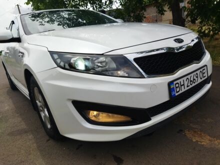 Білий Кіа Оптіма, об'ємом двигуна 2 л та пробігом 172 тис. км за 7200 $, фото 1 на Automoto.ua