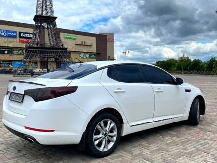 Білий Кіа Оптіма, об'ємом двигуна 2 л та пробігом 25600 тис. км за 9700 $, фото 1 на Automoto.ua