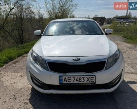 Белый Киа Оптима, объемом двигателя 2 л и пробегом 174 тыс. км за 10200 $, фото 1 на Automoto.ua