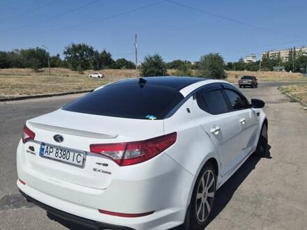 Белый Киа Оптима, объемом двигателя 2 л и пробегом 85 тыс. км за 12500 $, фото 1 на Automoto.ua