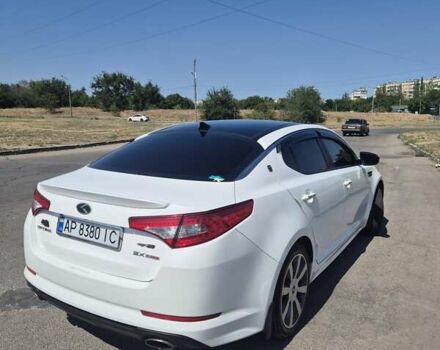 Белый Киа Оптима, объемом двигателя 2 л и пробегом 85 тыс. км за 12500 $, фото 1 на Automoto.ua