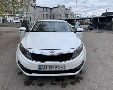 Белый Киа Оптима, объемом двигателя 2 л и пробегом 220 тыс. км за 10400 $, фото 1 на Automoto.ua