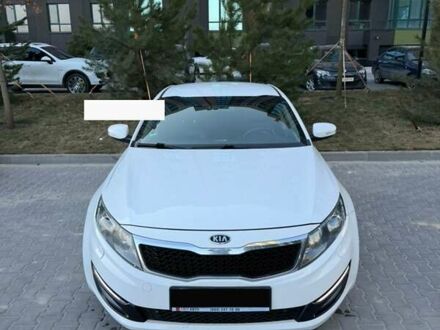 Білий Кіа Оптіма, об'ємом двигуна 2 л та пробігом 187 тис. км за 10900 $, фото 1 на Automoto.ua