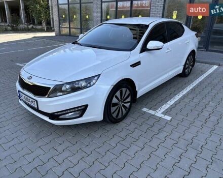Белый Киа Оптима, объемом двигателя 2 л и пробегом 150 тыс. км за 9800 $, фото 1 на Automoto.ua