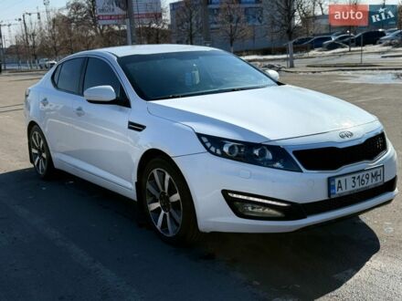 Белый Киа Оптима, объемом двигателя 2 л и пробегом 210 тыс. км за 9600 $, фото 1 на Automoto.ua
