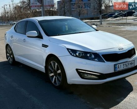 Белый Киа Оптима, объемом двигателя 2 л и пробегом 210 тыс. км за 9600 $, фото 1 на Automoto.ua