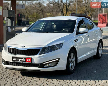 Белый Киа Оптима, объемом двигателя 2 л и пробегом 222 тыс. км за 9440 $, фото 1 на Automoto.ua