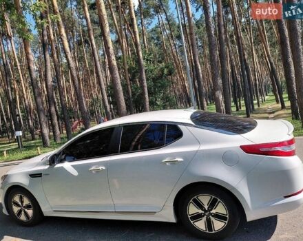 Білий Кіа Оптіма, об'ємом двигуна 2.36 л та пробігом 256 тис. км за 10300 $, фото 1 на Automoto.ua