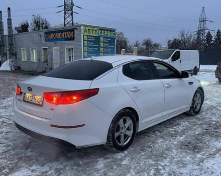 Білий Кіа Оптіма, об'ємом двигуна 2.36 л та пробігом 200 тис. км за 6950 $, фото 1 на Automoto.ua