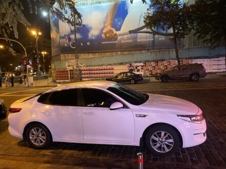 Белый Киа Оптима, объемом двигателя 2 л и пробегом 267 тыс. км за 11200 $, фото 1 на Automoto.ua