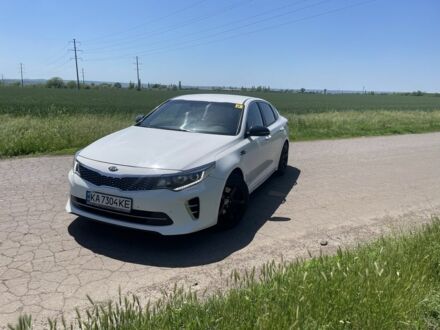 Білий Кіа Оптіма, об'ємом двигуна 1.7 л та пробігом 141 тис. км за 12000 $, фото 1 на Automoto.ua