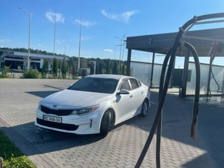 Білий Кіа Оптіма, об'ємом двигуна 2.4 л та пробігом 200 тис. км за 8900 $, фото 1 на Automoto.ua