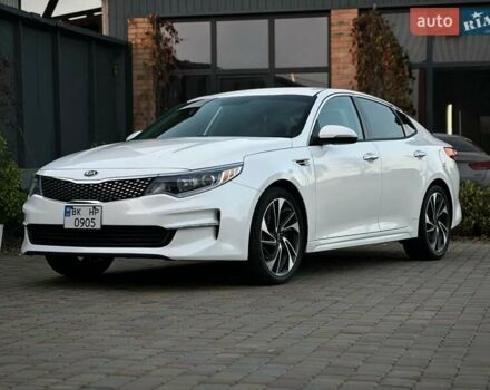Белый Киа Оптима, объемом двигателя 2.36 л и пробегом 110 тыс. км за 12500 $, фото 1 на Automoto.ua
