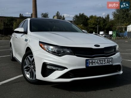 Білий Кіа Оптіма, об'ємом двигуна 2 л та пробігом 78 тис. км за 19900 $, фото 1 на Automoto.ua