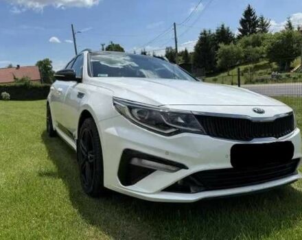 Белый Киа Оптима, объемом двигателя 2 л и пробегом 75 тыс. км за 10200 $, фото 1 на Automoto.ua