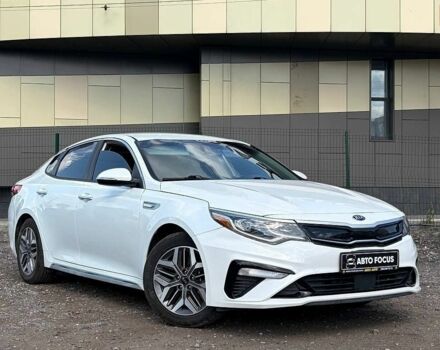 Білий Кіа Оптіма, об'ємом двигуна 2 л та пробігом 163 тис. км за 16990 $, фото 1 на Automoto.ua