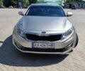 Бежевий Кіа Оптіма, об'ємом двигуна 2 л та пробігом 249 тис. км за 9500 $, фото 1 на Automoto.ua