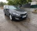 Черный Киа Оптима, объемом двигателя 2 л и пробегом 260 тыс. км за 9000 $, фото 1 на Automoto.ua