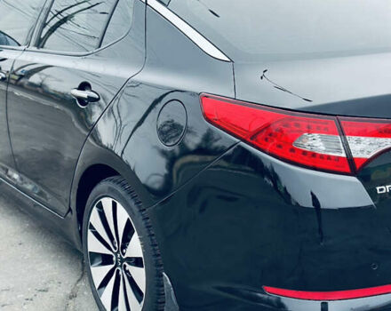 Черный Киа Оптима, объемом двигателя 2.36 л и пробегом 210 тыс. км за 9900 $, фото 6 на Automoto.ua