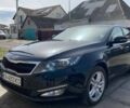 Чорний Кіа Оптіма, об'ємом двигуна 2 л та пробігом 186 тис. км за 11500 $, фото 1 на Automoto.ua